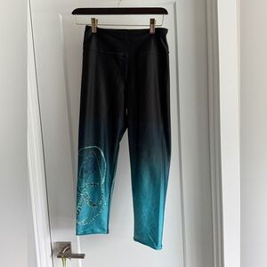 Women’s stretch pants size states medium runs small.